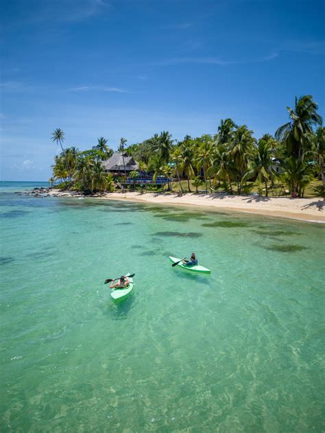 kayakers near a caribbean beach